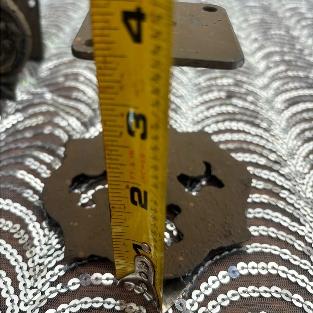 Antique cast iron curtain accents